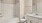 a bathroom with a tub toilet and sink