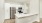 a kitchen with white cabinets