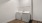 a white room with a washer and dryer