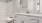 a bathroom with a tub sink and toilet
